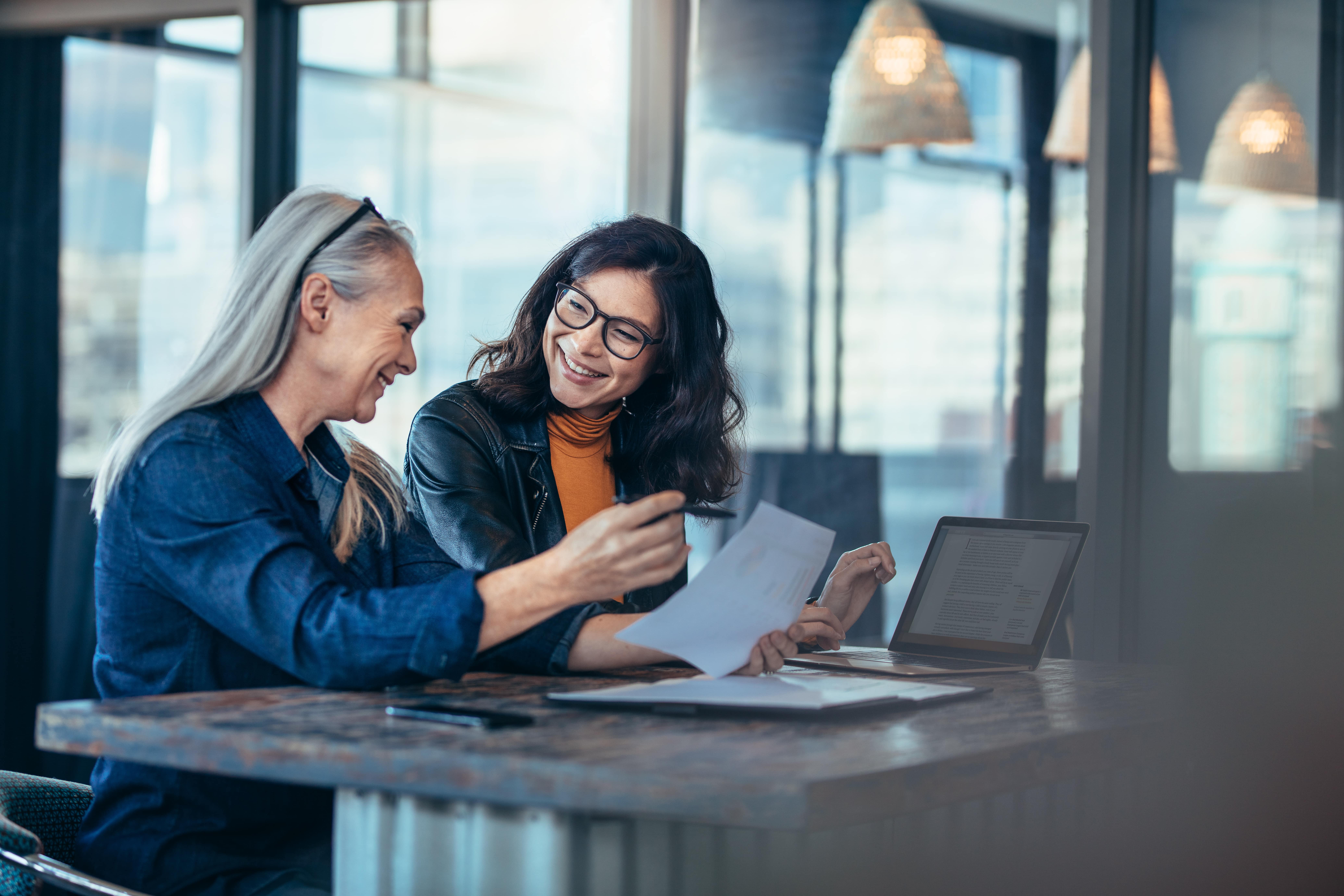 Two women in a desk